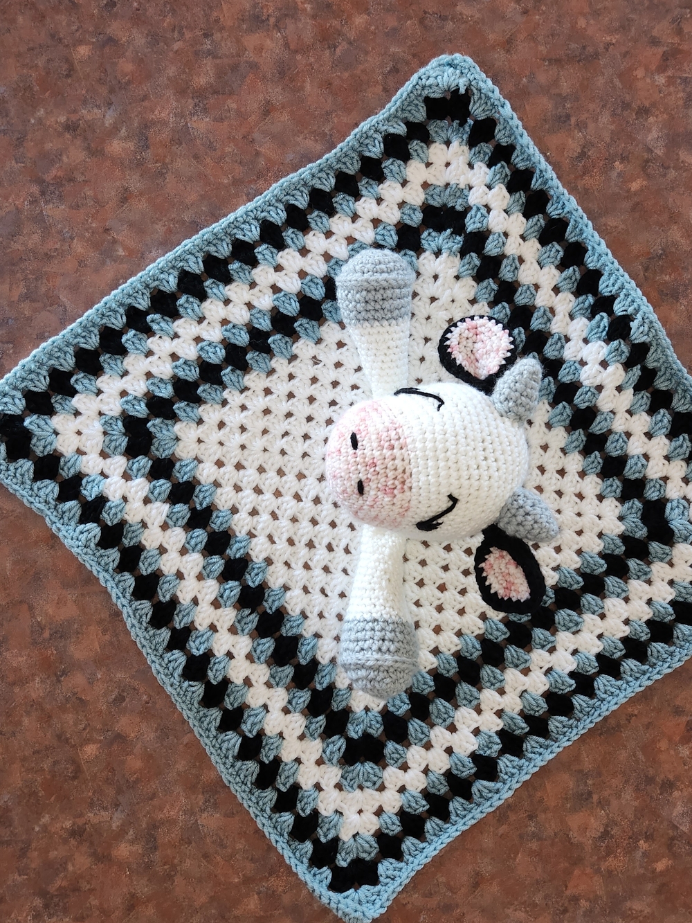 Crocheted Cow Lovey Blanket in White, Light Blue, Gray, Black